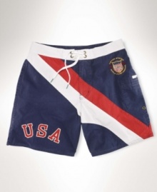 Rendered in a quick-drying blend of cotton and nylon, a classic-fitting swim trunk draws inspiration from vintage competition gear. Rendered in a quick-drying blend of cotton and nylon, a classic-fitting swim trunk draws inspiration from vintage competition gear.