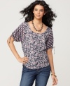 This Lucky Brand Jeans top is an easy, everyday basic with bohemian-inspired charm, thanks to a painted floral print. Rendered from a lightweight cotton blend, it's made for warmer days, too!