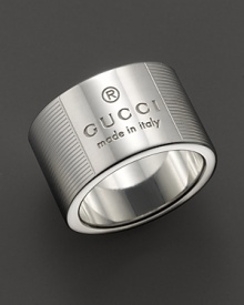 From the Gucci Trademark collection, a sterling silver ring adorned with Gucci logo and etched stripe pattern. Designed by Gucci. From the Gucci Trademark collection, a sterling silver ring adorned with Gucci logo and etched stripe pattern. Designed by Gucci.