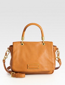 A versatile flap-top shape in rich pebbled leather. Top handle, 4¾ dropAdjustable detachable shoulder strap, 16½-21 dropMagnetic snap on flap closureOne inside zip pocketTwo inside open pocketsLogo-printed lining10W X 7H X 4DImported A versatile flap-top shape in rich pebbled leather. Top handle, 4¾ dropAdjustable detachable shoulder strap, 16½-21 dropMagnetic snap on flap closureOne inside zip pocketTwo inside open pocketsLogo-printed lining10W X 7H X 4DImported