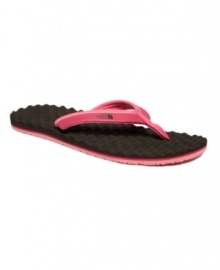 Super soft and super stylish. The Base Camp flip flops from The North Face make your summer steps even more relaxing with the cushioning of an egg-crate-inspired footbed.