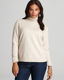 Cozy meets chic as sumptuous wool outfits a sleek Lafayette 148 New York Plus turtleneck. Cozy meets chic as sumptuous wool outfits a sleek Lafayette 148 New York Plus turtleneck.
