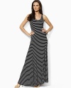 Crafted in sleek modal jersey, a flowing maxi dress is designed with chic godet pleats for a full-skirt silhouette.
