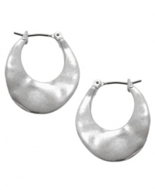 Sculptured style. Kenneth Cole New York's free form hoop earrings have an artistic aesthetic. Crafted in silver tone mixed metal. Approximate drop: 1 inch. Approximate diameter: 3/4 inch. Sculptured style. Kenneth Cole New York's free form hoop earrings have an artistic aesthetic. Crafted in silver tone mixed metal. Approximate drop: 1 inch. Approximate diameter: 3/4 inch.