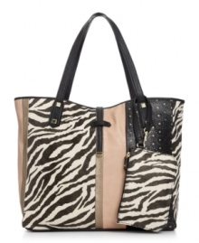 Go for something wild with this safari-inspired shopper from Danielle Nicole. The contrast of colorblocking and zebra print pattern, accented with luxe golden hardware and slim tab closure, complete the look with delicate detail. Go for something wild with this safari-inspired shopper from Danielle Nicole. The contrast of colorblocking and zebra print pattern, accented with luxe golden hardware and slim tab closure, complete the look with delicate detail.