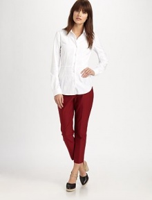Structured cotton blend fabric in a tailored, cropped style. Front zipper with button tab closureBelt loopsBack besom pocketsInseam, about 3358% cotton/38% rayon/4% spandexDry cleanMade in USAModel shown is 5'10 (177cm) wearing US size 4. Structured cotton blend fabric in a tailored, cropped style. Front zipper with button tab closureBelt loopsBack besom pocketsInseam, about 3358% cotton/38% rayon/4% spandexDry cleanMade in USAModel shown is 5'10 (177cm) wearing US size 4.