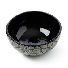 Used in an artistic way, inlaid eggshells make up a unique design. Lacquered to a high shine, the exotic result adds style and drama to settings. Used in an artistic way, inlaid eggshells make up a unique design. Lacquered to a high shine, the exotic result adds style and drama to settings.