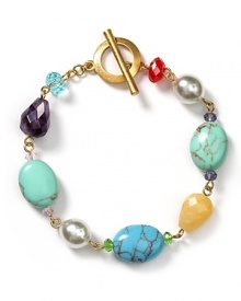 Take your jewel box on vacation with Lauren by Ralph Lauren's chunky beaded bracelet. With tropical tones and textures, this strand complements sand-colored separates. Take your jewel box on vacation with Lauren by Ralph Lauren's chunky beaded bracelet. With tropical tones and textures, this strand complements sand-colored separates.
