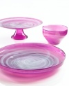 Adding a fun shock of color to dessert, the Sweet Plum cake stand from Sea Glasbruk pairs luminous violet with swirls of white in handcrafted glass.