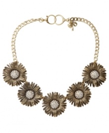 Spruce up your look for spring. Fossil's vintage-themed collar necklace features five intricate daisy's with sparkling crystal-coated centers. Setting crafted in oxidized brass tone mixed metal with a lobster claw closure. Approximate length: 18 inches. Spruce up your look for spring. Fossil's vintage-themed collar necklace features five intricate daisy's with sparkling crystal-coated centers. Setting crafted in oxidized brass tone mixed metal with a lobster claw closure. Approximate length: 18 inches.