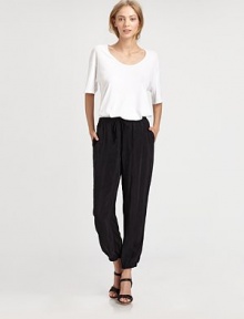 Pure cotton classic styled with dropped shoulders, elbow-length sleeves and a split asymmetrical hem. ScoopneckDropped shouldersElbow-length sleevesSplit asymmetrical hemCombed cottonHand washMade in USA of imported fabricModel shown is 5'9 (176cm) wearing US size Small. Pure cotton classic styled with dropped shoulders, elbow-length sleeves and a split asymmetrical hem. ScoopneckDropped shouldersElbow-length sleevesSplit asymmetrical hemCombed cottonHand washMade in USA of imported fabricModel shown is 5'9 (176cm) wearing US size Small.
