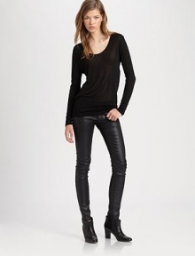 Back cutouts add a contemporary spin to this whisper-weight jersey must-have. ScoopneckLong sleevesBack cutoutsRayonDry cleanMade in USAModel shown is 5'9½ (176cm) wearing US size Small. Back cutouts add a contemporary spin to this whisper-weight jersey must-have. ScoopneckLong sleevesBack cutoutsRayonDry cleanMade in USAModel shown is 5'9½ (176cm) wearing US size Small.