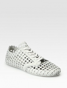Sporty, modern lace-up design in woven leather.Leather liningPadded insoleRubber soleImported