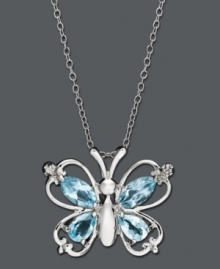 Take your style to new heights in this nature-inspired pendant by Victoria Townsend. Pear and marquise-cut blue topaz (2-3/8 ct. t.w.) adds a colorful touch to this diamond-accented butterfly. Crafted in sterling silver. Approximate length: 18 inches. Approximate drop: 3/4 inch. Take your style to new heights in this nature-inspired pendant by Victoria Townsend. Pear and marquise-cut blue topaz (2-3/8 ct. t.w.) adds a colorful touch to this diamond-accented butterfly. Crafted in sterling silver. Approximate length: 18 inches. Approximate drop: 3/4 inch.