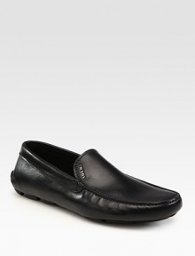 Supple Italian calfskin with comfortable rubber gripper soles and a silver logo accent. Leather lining Padded insole Leather sole Made in Italy Supple Italian calfskin with comfortable rubber gripper soles and a silver logo accent. Leather lining Padded insole Leather sole Made in Italy