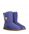 A stylish twist on a venerable classic, the UGG Australia Bailey Button boot is a welcome colorful addition to your cold weather casual wardrobe - Crafted from twin-faced sheepskin and featuring exposed seams, reinforced heel, traction outsole, signature UGG label, wooden button and elastic band closure, fleece-lined for superior warmth and comfort - Hits above the ankle - Truly versatile, perfect for pairing with everything from skinny jeans to yoga pants to mini-skirts