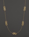 Hammered 18K yellow gold stations decorate a delicate chain on this timeless Roberto Coin necklace.