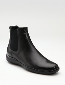 A classic shape of supple Nappa leather featuring elasticized gores on either side.Leather lining Padded insole Rubber sole Imported A classic shape of supple Nappa leather featuring elasticized gores on either side.Leather lining Padded insole Rubber sole Imported