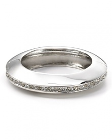 Crystals make a cool statement on this hinged cuff from Alexis Bittar, boasting rhodium plate and a chunky chic look. Resist the urge to stack: this bracelet stands out solo. Crystals make a cool statement on this hinged cuff from Alexis Bittar, boasting rhodium plate and a chunky chic look. Resist the urge to stack: this bracelet stands out solo.