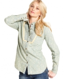 An allover floral print adds a hint of femininity to this otherwise boyish chambray shirt by Free People! An allover floral print adds a hint of femininity to this otherwise boyish chambray shirt by Free People!
