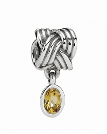 A bezel-set bear quartz dangles from a sterling silver knotted charm. By PANDORA. A bezel-set bear quartz dangles from a sterling silver knotted charm. By PANDORA.