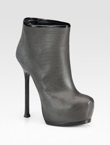 An always chic style of lizard-embossed leather, with a towering heel and patent leather trim. Stacked heel, 5½ (140mm)Hidden wooden platform, 1½ (40mm)Compares to a 4 heel (100mm)Lizard-embossed leather upper with patent leather trimPull-on styleLeather lining and solePadded insoleMade in Italy An always chic style of lizard-embossed leather, with a towering heel and patent leather trim. Stacked heel, 5½ (140mm)Hidden wooden platform, 1½ (40mm)Compares to a 4 heel (100mm)Lizard-embossed leather upper with patent leather trimPull-on styleLeather lining and solePadded insoleMade in Italy