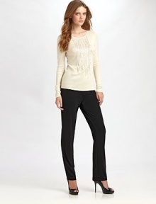 Gorgeous cascading beads give this cozy knit top an added dash of glamour.ScoopneckLong sleevesFront beaded detailAbout 25 from shoulder to hem55% rayon/45% nylonDry cleanImported Model shown is 5'10½ (179cm) wearing US size Small. Gorgeous cascading beads give this cozy knit top an added dash of glamour.ScoopneckLong sleevesFront beaded detailAbout 25 from shoulder to hem55% rayon/45% nylonDry cleanImported Model shown is 5'10½ (179cm) wearing US size Small.