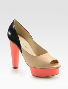 Smooth leather in a modern colorblock design with a chunky heel and an island platform. Self-covered heel, 4½ (115mm)Island platform, 1 (25mm)Compares to a 3½ heel (90mm)Leather upperLeather lining and solePadded insoleImportedOUR FIT MODEL RECOMMENDS ordering true size. Smooth leather in a modern colorblock design with a chunky heel and an island platform. Self-covered heel, 4½ (115mm)Island platform, 1 (25mm)Compares to a 3½ heel (90mm)Leather upperLeather lining and solePadded insoleImportedOUR FIT MODEL RECOMMENDS ordering true size.