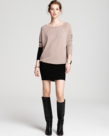 At a longer length, this über-soft Aqua Cashmere color block tunic can be worn with leggings, tights or bare-legged for an effortlessly cool look workdays or weekends. At a longer length, this über-soft Aqua Cashmere color block tunic can be worn with leggings, tights or bare-legged for an effortlessly cool look workdays or weekends.