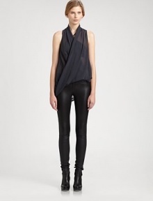 Expertly cut and draped, this silk-like top features a crossover v-neck and hi-lo hem. Crossover v-neckSleevelessDraped hi-lo hemPolyesterDry cleanMade in USA of Italian fabricModel shown is 5'10 (177cm) wearing US size Small. Expertly cut and draped, this silk-like top features a crossover v-neck and hi-lo hem. Crossover v-neckSleevelessDraped hi-lo hemPolyesterDry cleanMade in USA of Italian fabricModel shown is 5'10 (177cm) wearing US size Small.