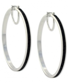 Hit the right notes with these hoop earrings from Jessica Simpson. Crafted from silver tone mixed metal, they also shine with black glitter. Approximate drop: 2-1/2 inches. Approximate diameter: 2-1/2 inches. Hit the right notes with these hoop earrings from Jessica Simpson. Crafted from silver tone mixed metal, they also shine with black glitter. Approximate drop: 2-1/2 inches. Approximate diameter: 2-1/2 inches.