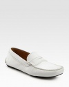 EXCLUSIVELY AT SAKS. A signature look that weds comfort and style, crafted with penny-loafer detail and a rubber driver sole. Leather liningPadded insoleRubber soleMade in Italy