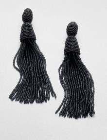 An elegant style with long strands of shiny beads. Glass beadsLength, about 5Clip-on backImported An elegant style with long strands of shiny beads. Glass beadsLength, about 5Clip-on backImported