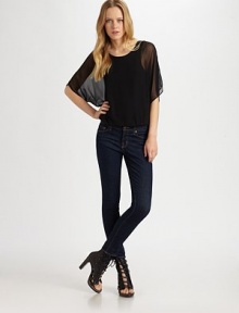 Fully lined chiffon scoopneck with silk trim and semi-sheer dolman sleeves, secured by a comfortable elasticized hem. ScoopneckSemi-sheer, three-quarter dolman sleevesElasticized hemSilk trim96% rayon/4% spandexDry cleanMade in USAModel shown is 5'10 (177cm) wearing US size 4. Fully lined chiffon scoopneck with silk trim and semi-sheer dolman sleeves, secured by a comfortable elasticized hem. ScoopneckSemi-sheer, three-quarter dolman sleevesElasticized hemSilk trim96% rayon/4% spandexDry cleanMade in USAModel shown is 5'10 (177cm) wearing US size 4.