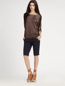 Glistening silk boatneck has three-quarter dolman sleeves and an unanticipated hi-low hem. BoatneckThree-quarter dolman sleevesHi-low hem hits below the hipsSilkDry cleanImportedModel shown is 5'10 (177cm) wearing US size Small. Glistening silk boatneck has three-quarter dolman sleeves and an unanticipated hi-low hem. BoatneckThree-quarter dolman sleevesHi-low hem hits below the hipsSilkDry cleanImportedModel shown is 5'10 (177cm) wearing US size Small.
