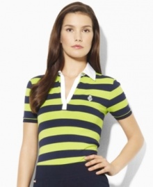 A sleek stretch jersey polo is updated with windbreaker-inspired details for a modern take on athletic style, from Lauren by Ralph Lauren. A sleek stretch jersey polo is updated with windbreaker-inspired details for a modern take on athletic style, from Lauren by Ralph Lauren.