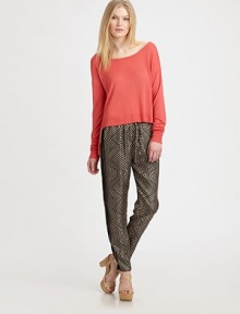 Slip into this soft-stretch design in a warm hue for a casual-cool look. BoatneckDropped shouldersLong sleevesRibbed trim at neckline, cuffs and hemViscoseDry cleanImportedModel shown is 5'10 (177cm) wearing US size Small. Slip into this soft-stretch design in a warm hue for a casual-cool look. BoatneckDropped shouldersLong sleevesRibbed trim at neckline, cuffs and hemViscoseDry cleanImportedModel shown is 5'10 (177cm) wearing US size Small.