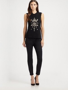 Sleek stretch jersey, embellished with an ornate embroidered design.Jewel necklineSleevelessEmbroidered frontConcealed back zip85% viscose/11% polyester/4% elastaneDry cleanMade in USA of Italian fabricModel shown is 5'11 (180cm) wearing US size 4. Sleek stretch jersey, embellished with an ornate embroidered design.Jewel necklineSleevelessEmbroidered frontConcealed back zip85% viscose/11% polyester/4% elastaneDry cleanMade in USA of Italian fabricModel shown is 5'11 (180cm) wearing US size 4.