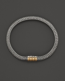 John Hardy sterling silver and gold bracelet with single station. John Hardy sterling silver and gold bracelet with single station.