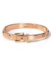 Embrace a boy-borrowed ethos with MICHAEL Michael Kors' handsome bangle. With buckle detailing and rosy tone, it strikes a masculine-feminine balance.