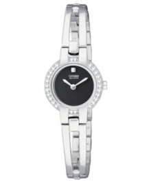 Crystals line the silhouette of this feminine Eco-Drive watch by Citizen. Crystals line the silhouette of this feminine Eco-Drive watch by Citizen.