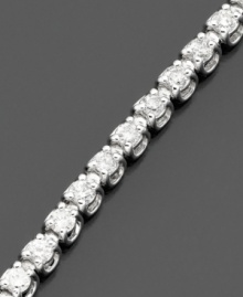 Elegant round-cut diamonds (2 ct. t.w.) are perfectly arranged in this stunning tennis bracelet set in 14k white gold. 2 carat diamond bracelet approximate length: 7-1/4 inches. Elegant round-cut diamonds (2 ct. t.w.) are perfectly arranged in this stunning tennis bracelet set in 14k white gold. 2 carat diamond bracelet approximate length: 7-1/4 inches.