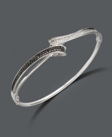 Let all the elements of style come together in this chic, contrasting bangle. Sterling silver bracelet features round-cut black diamonds (1/6 ct. t.w.) and white diamonds (1-1/10 ct. t.w.). Approximate diameter: 2-1/2 inches. Let all the elements of style come together in this chic, contrasting bangle. Sterling silver bracelet features round-cut black diamonds (1/6 ct. t.w.) and white diamonds (1-1/10 ct. t.w.). Approximate diameter: 2-1/2 inches.