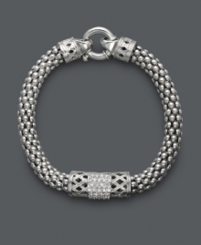 Embrace a little vintage-inspired elegance. This retro bracelet receives a modern touch with a tasteful, thick chain, intricate crisscross pattern, and rows of round-cut diamonds (1/4 ct. t.w.). Crafted in sterling silver. Approximate length: 8-1/2 inches. Embrace a little vintage-inspired elegance. This retro bracelet receives a modern touch with a tasteful, thick chain, intricate crisscross pattern, and rows of round-cut diamonds (1/4 ct. t.w.). Crafted in sterling silver. Approximate length: 8-1/2 inches.