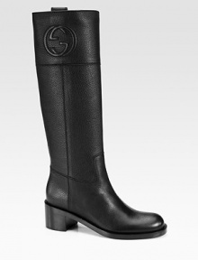 Tall pebbled leather silhouette with a stacked heel and GG logo. Stacked heel, 2 (50mm)Shaft, 16Leg circumference, 14Leather upperPull-on styleLeather lining and solePadded insoleMade in Italy