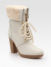Textured leather style with decorative stitching features a lace-up front, zipper and shearling lining. Crepe rubber heel, 4 (100mm) Crepe rubber platform, ¼ (5mm) Compares to a 3¾ heel (95mm) Leather upper Shearling lining Rubber sole Padded insole ImportedOUR FIT MODEL RECOMMENDS ordering true whole size; ½ sizes should order the next whole size up. Textured leather style with decorative stitching features a lace-up front, zipper and shearling lining. Crepe rubber heel, 4 (100mm) Crepe rubber platform, ¼ (5mm) Compares to a 3¾ heel (95mm) Leather upper Shearling lining Rubber sole Padded insole ImportedOUR FIT MODEL RECOMMENDS ordering true whole size; ½ sizes should order the next whole size up.