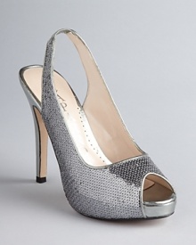 Your favorite peep toe platform pumps get dolled up to dance the night away in shimmering sequins. Vegas or New York, these work with evening wear or denim. Your favorite peep toe platform pumps get dolled up to dance the night away in shimmering sequins. Vegas or New York, these work with evening wear or denim.