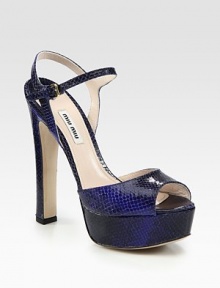 Snake-print leather design with an adjustable ankle strap, grounded by an ultra-high heel and platform. Self-covered heel, 5½ (140mm)Covered platform, 1 (25mm)Compares to a 4½ heel (115mm)Snake-print leather upperLeather lining and solePadded insoleMade in ItalyOUR FIT MODEL RECOMMENDS ordering true size. Snake-print leather design with an adjustable ankle strap, grounded by an ultra-high heel and platform. Self-covered heel, 5½ (140mm)Covered platform, 1 (25mm)Compares to a 4½ heel (115mm)Snake-print leather upperLeather lining and solePadded insoleMade in ItalyOUR FIT MODEL RECOMMENDS ordering true size.