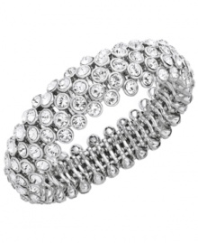 Give your style a sparkling pick-me-up. Charter Club's slip-on bangle features clear glass accents set in silver tone mixed metal. Bracelet stretches to fit wrist. Approximate diameter: 2-1/4 inches. Give your style a sparkling pick-me-up. Charter Club's slip-on bangle features clear glass accents set in silver tone mixed metal. Bracelet stretches to fit wrist. Approximate diameter: 2-1/4 inches.