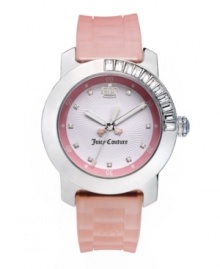 Perfectly pink with just the right amount of shine, Juicy Couture's BFF watch is your new best friend. Pink silicone strap and round stainless steel case. Bezel crystallized with baquette-cut Swarovski elements from twelve to three o'clock. Textured white dial features pink minute track at outer ring, crystal accents at markers, iconic crown logo at twelve o'clock, three hands with pink accents, and script logo. Quartz movement. Water resistant to 30 meters. Two-year limited warranty.